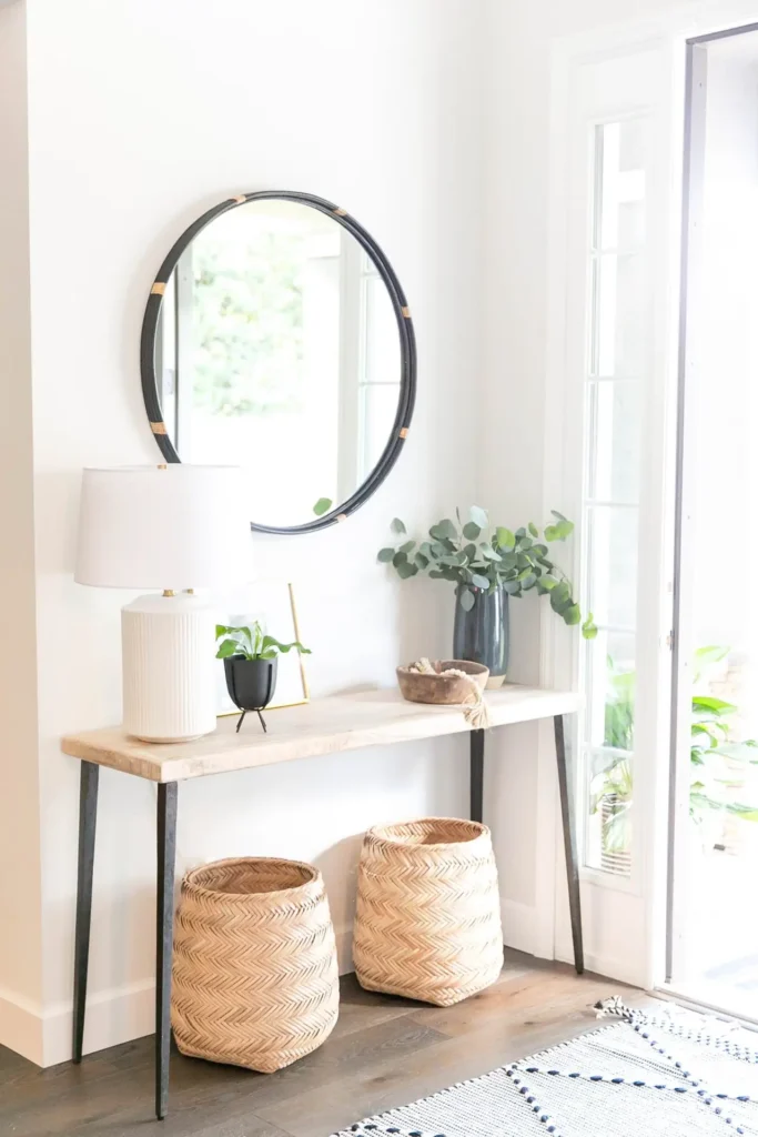 A table with baskets and plants on it
